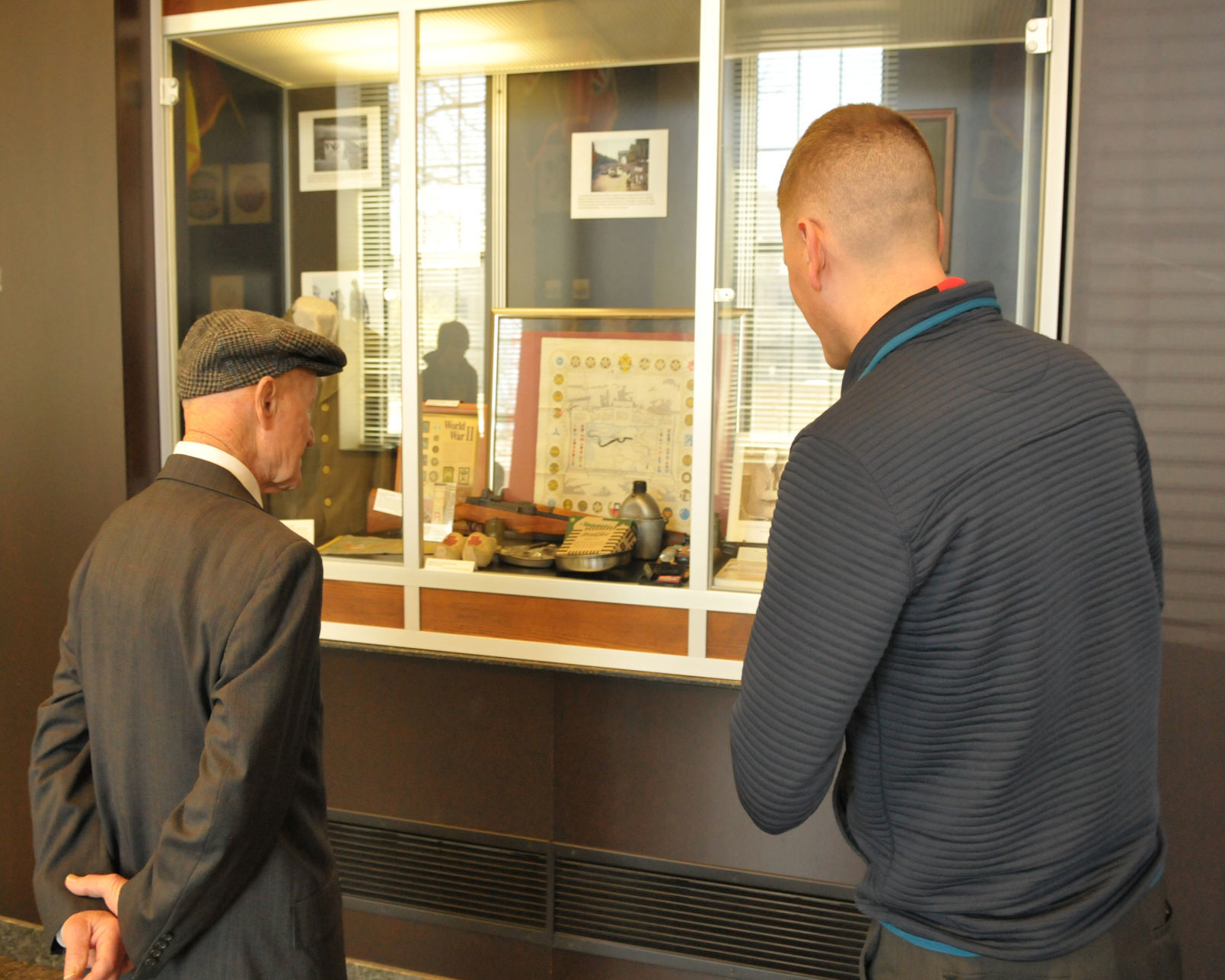 Henry Langrehr looking at museum case